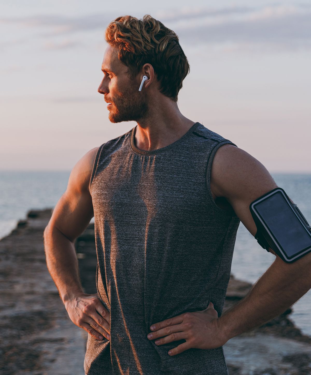 Thoughtful man with a beard and engaging expression.