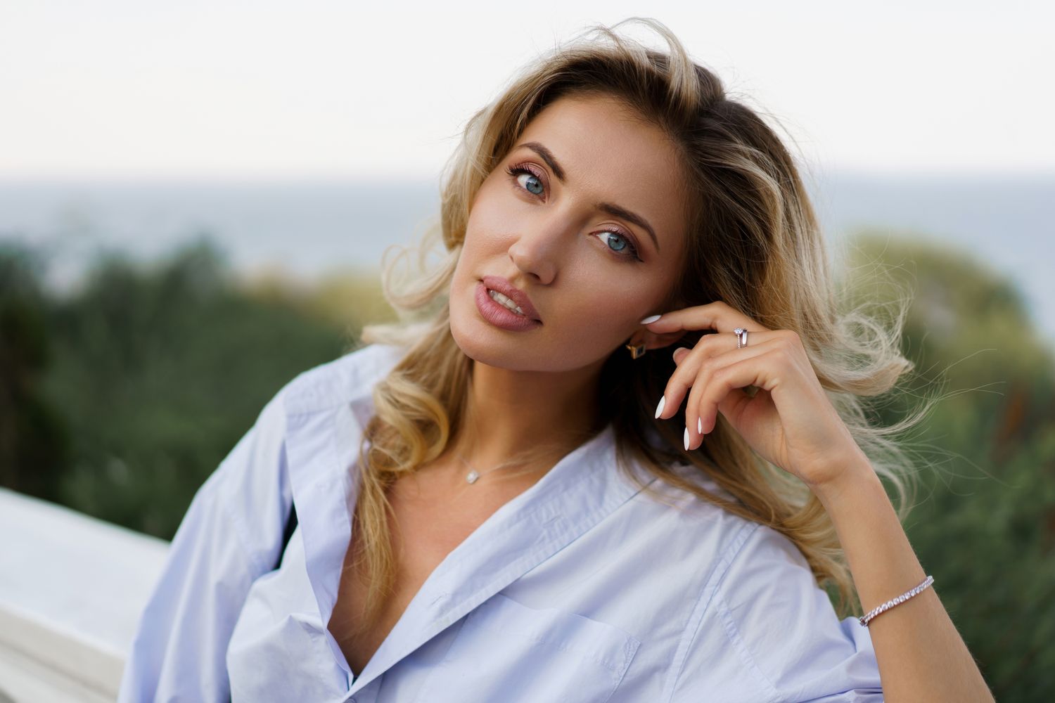 Portrait of a woman with long black hair.